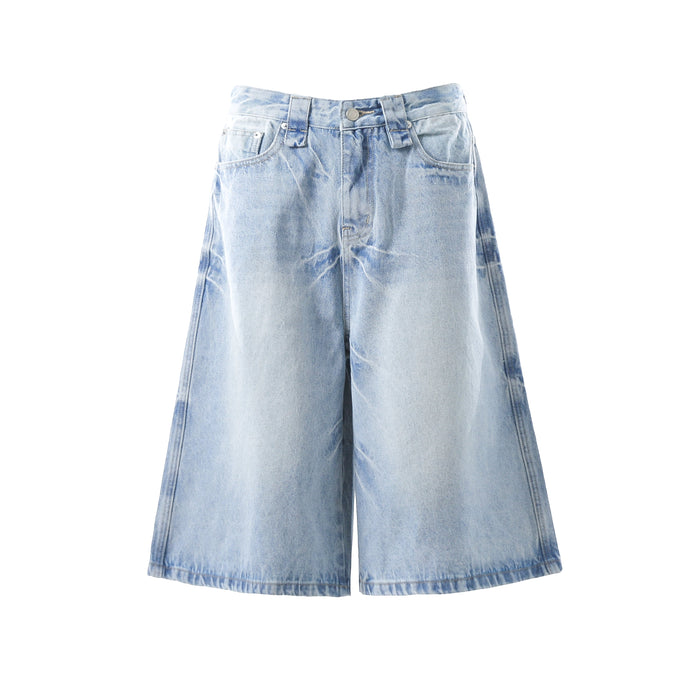 Light wash wide-leg denim shorts front view with button waist and A-line shape
