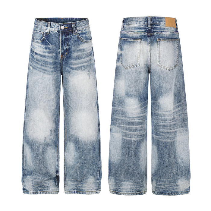 Light blue washed wide-leg jeans shown in front and back views with faded detailing and straight hems