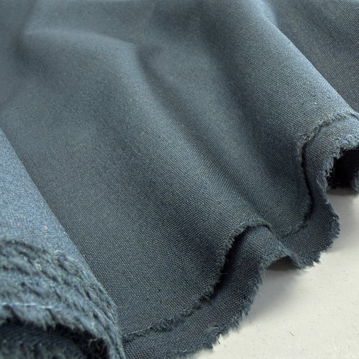 Dark Teal fabric made from a blend of Linen, Viscose, and Poly, showcasing its soft texture and versatility for apparel and home decor.