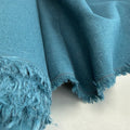 Linen + Viscose + Poly Mix in Ocean Teal from Simplifi Fabric, showcasing the beautiful texture and color of the fabric suitable for apparel and home decor.