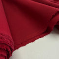 Linen + Viscose + Poly Mix - Ruby Red fabric in a close-up showing its soft texture and vibrant color, perfect for sewing apparel and home decor projects.