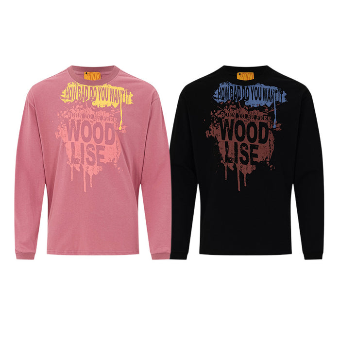 Pink and black long sleeve graphic tees with contrasting graffiti-style paint splash text on the fronts