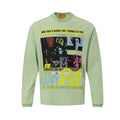 Front view of the light green long sleeve tee featuring a colorful retro pop art graphic and yellow star cuffs