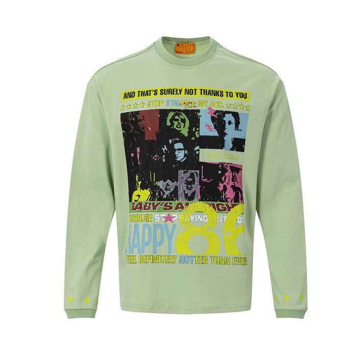 Front view of the light green long sleeve tee featuring a colorful retro pop art graphic and yellow star cuffs