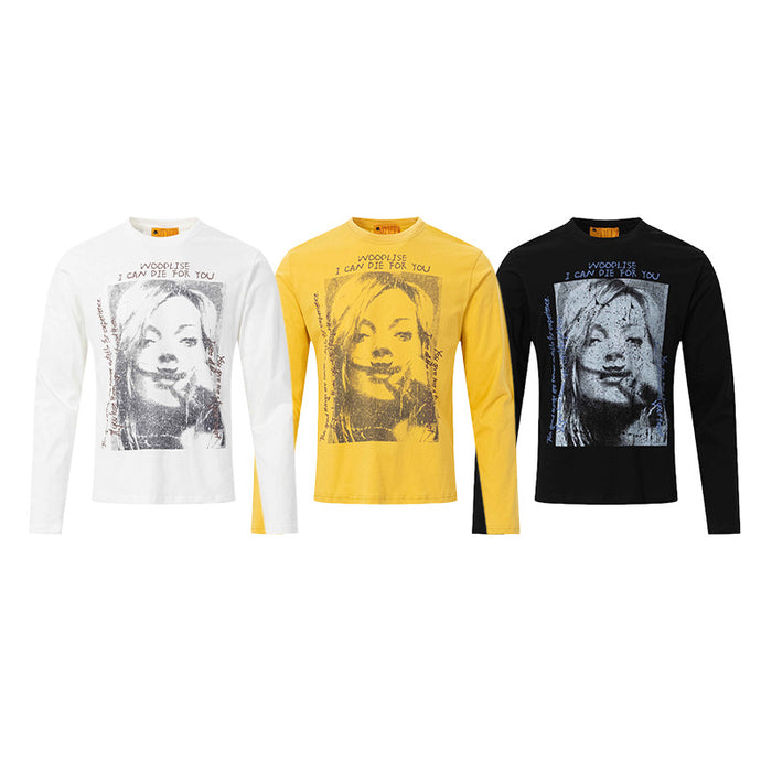Three long-sleeve crew neck graphic shirts in white, yellow, and black with portrait prints
