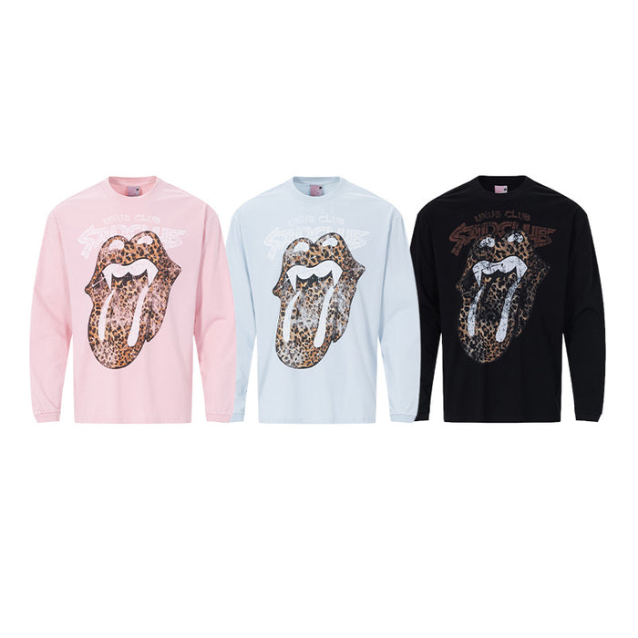 Three long-sleeve graphic tees in pink, light blue, and black with leopard-print tongue designs