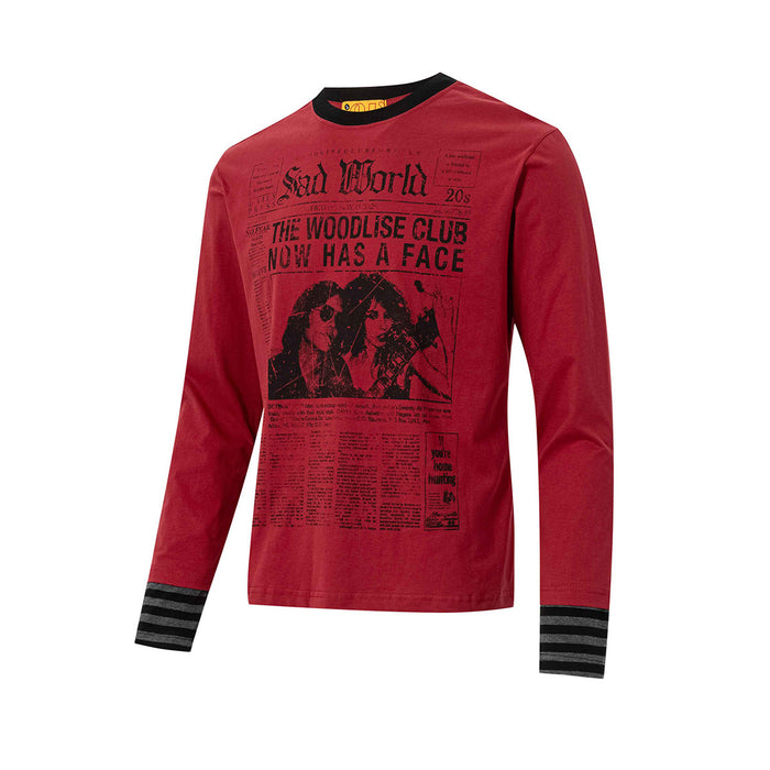 Red long sleeve shirt with black newspaper graphic, portrait artwork, black collar, and striped cuffs