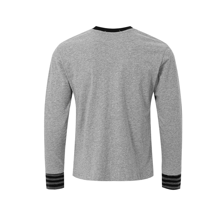 Back view of gray long sleeve shirt with plain fabric, black collar, and striped cuffs