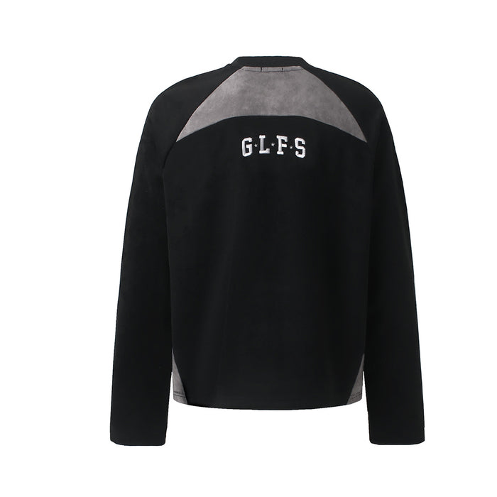 Back view of black suede-texture tee with gray shoulder yoke, black panels, and GLFS lettering