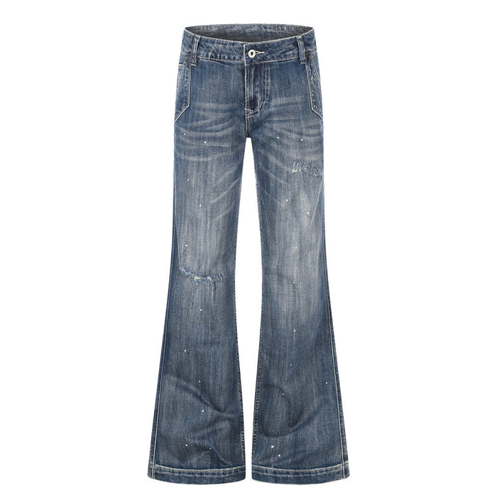 Front view of blue distressed wide leg jeans with low rise and flared hems