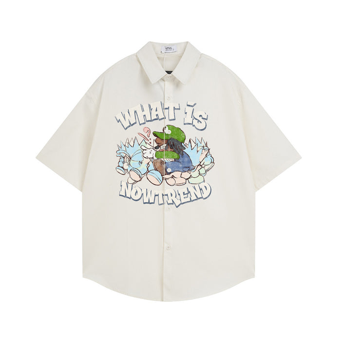 Cream oversized short sleeve button-down shirt with cartoon front graphic