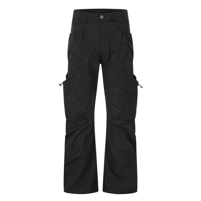 Black cargo utility pants with wide legs, front view showing mesh thigh panels