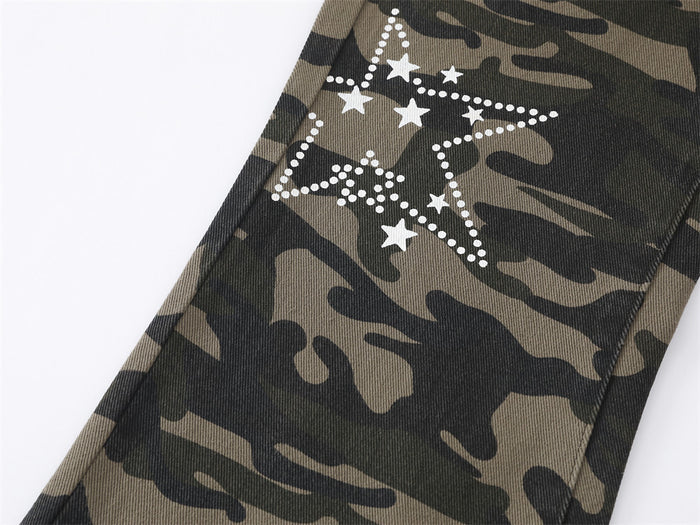 Close-up of a large white dotted star graphic with smaller stars on the camouflage leg