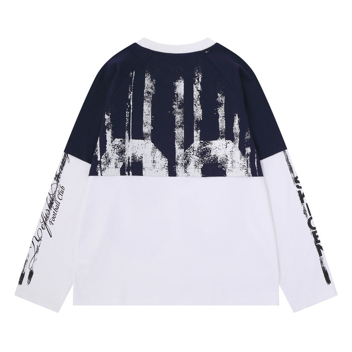 Navy and white colorblock tee back featuring distressed vertical graphics on the upper panel and printed white sleeves