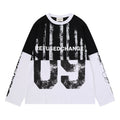 Black and white colorblock long-sleeve tee front with distressed stripes, REFUSED CHANGE lettering and oversized 09 graphic