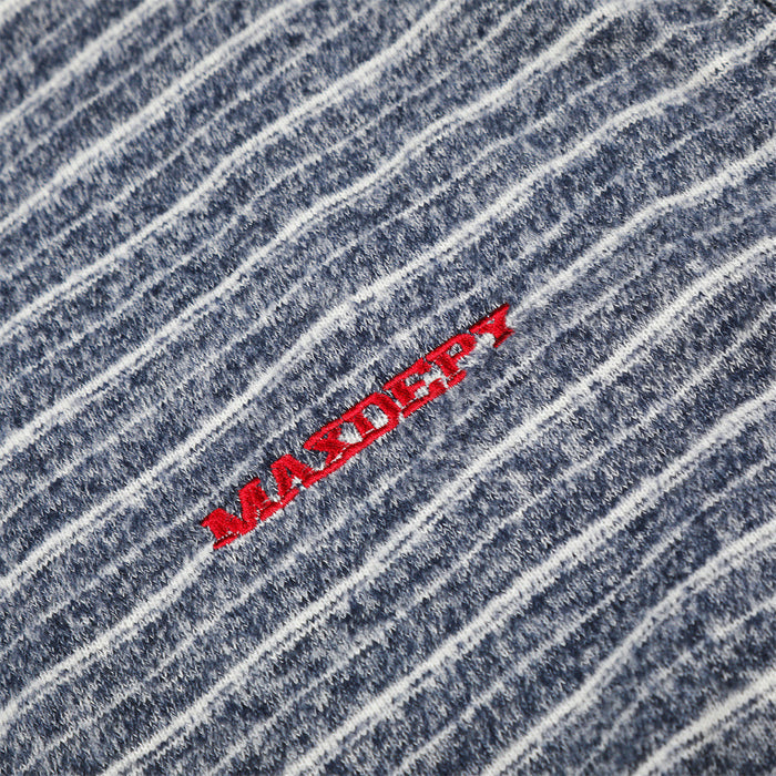 Close-up of navy striped hoodie fabric with raised red embroidered lettering
