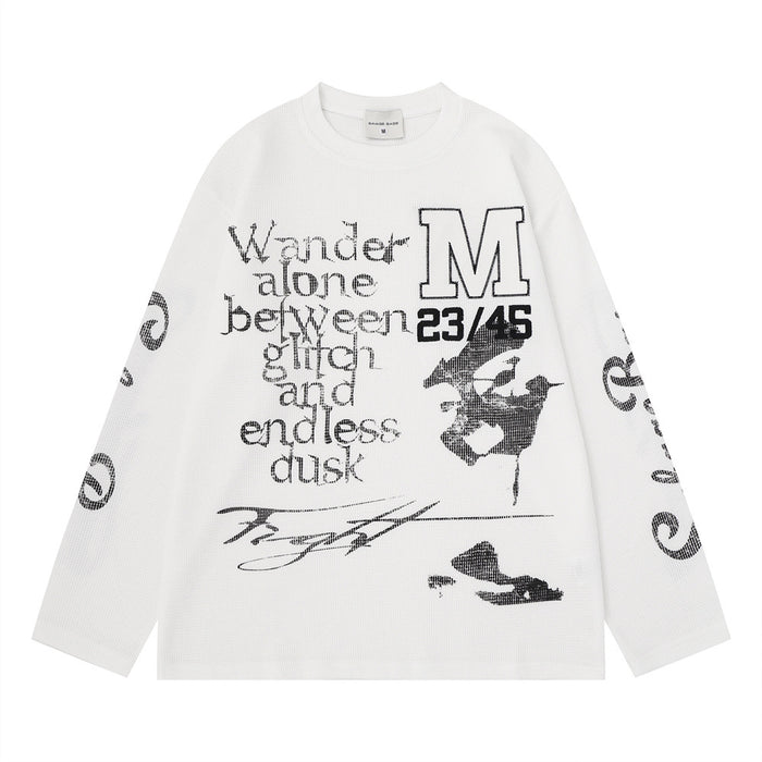 White waffle knit long sleeve shirt with layered black text, large M graphic, numbers, and abstract artwork