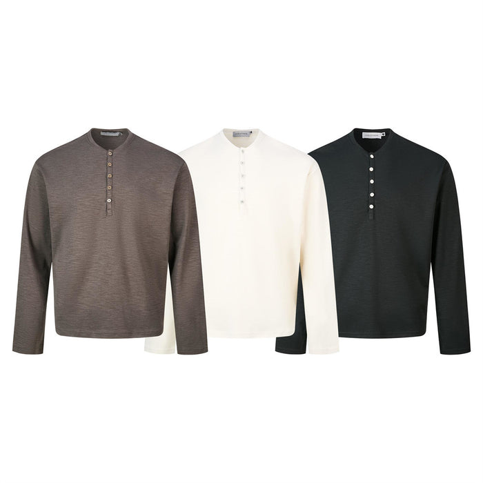 Three long-sleeve Henley shirts in brown, cream, and black with round collars and button plackets