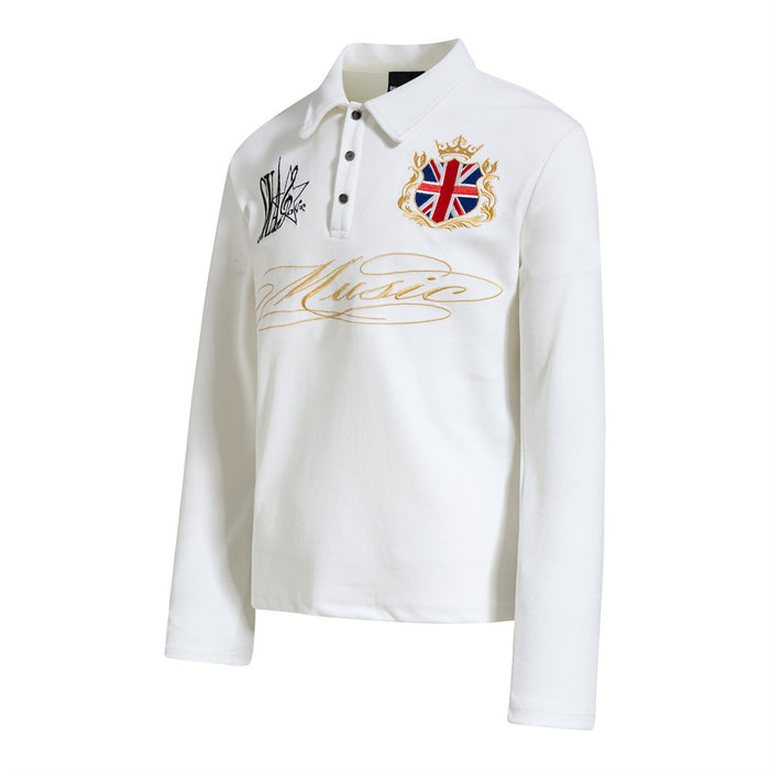 White long-sleeve polo shirt shown from an angled front view with gold script and a crowned Union Jack crest