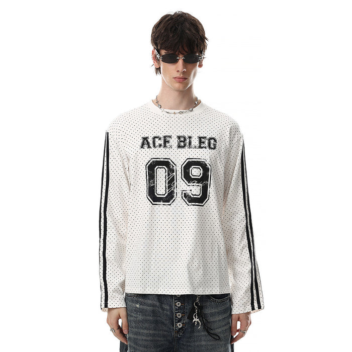 White long-sleeve tee worn on a model, featuring a dotted pattern, black sleeve stripes, ACE BLEG text, and number 09