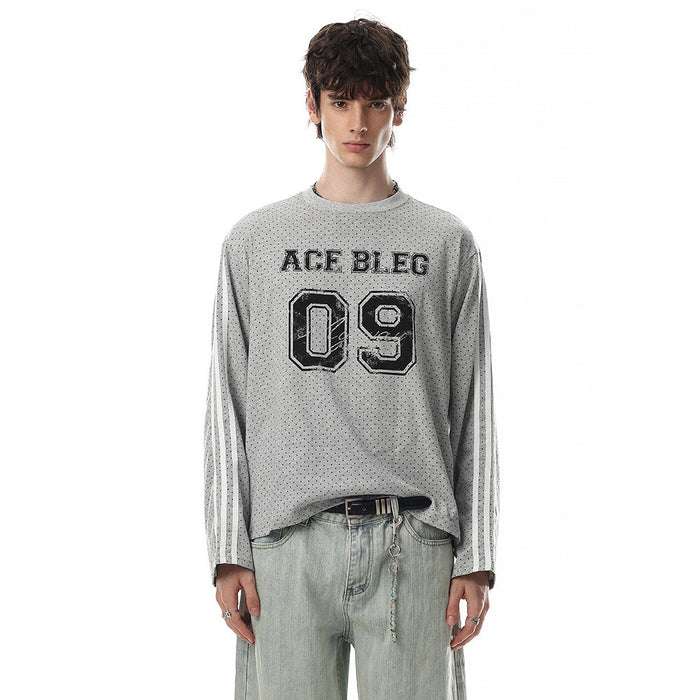 Gray long-sleeve tee worn on a model with a dotted pattern, striped sleeves, ACE BLEG text, and large number 09