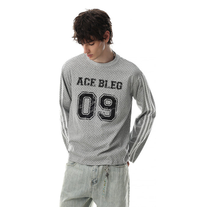 Angled view of a gray dotted long-sleeve tee with striped sleeves, ACE BLEG lettering, and a large number 09