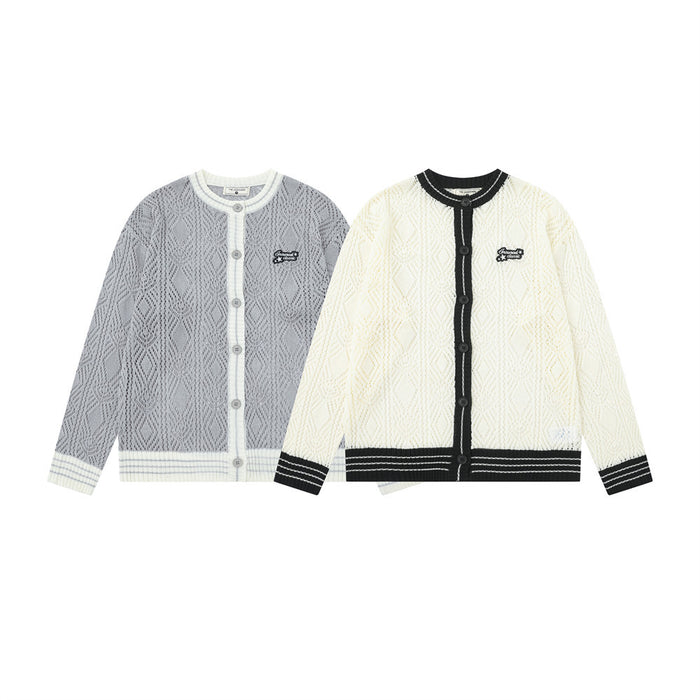Gray and cream open-knit cardigan sweaters with diamond texture, contrasting trim, button fronts, and ribbed cuffs