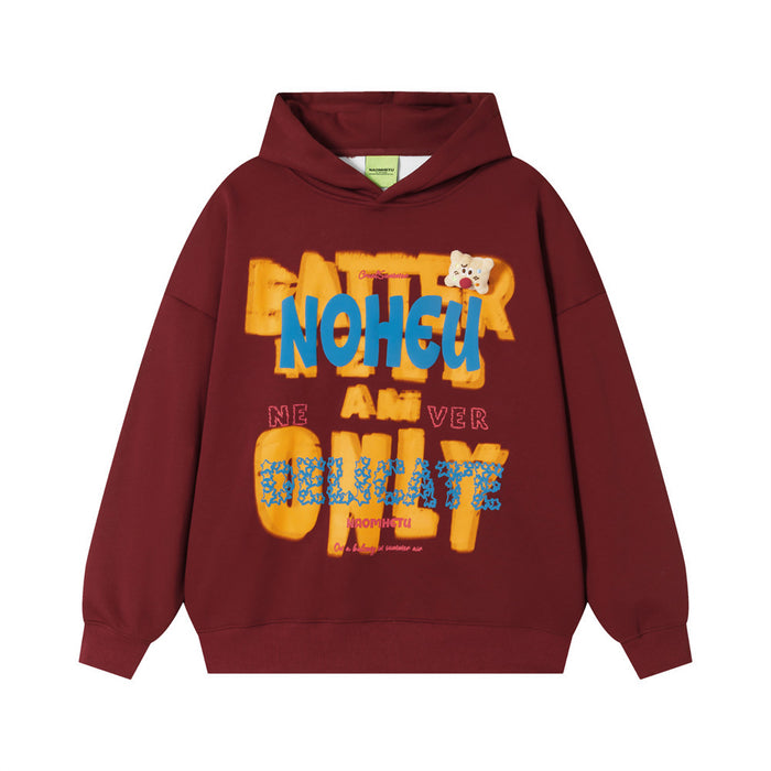 Men's oversized pullover hoodie with bold graffiti-style letter graphic print and bear patch in burgundy colorway
