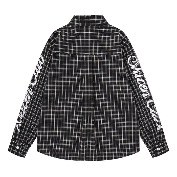 Back view of a black plaid long-sleeve shirt with white script lettering along both sleeves