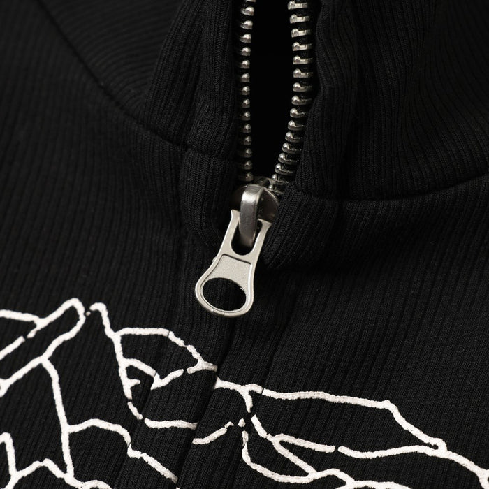 Close-up of silver zipper pull on black sweatshirt jacket with white wave print