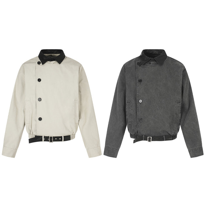 Two moto-inspired workwear jackets, cream and charcoal, with black contrast collars and irregular button fronts