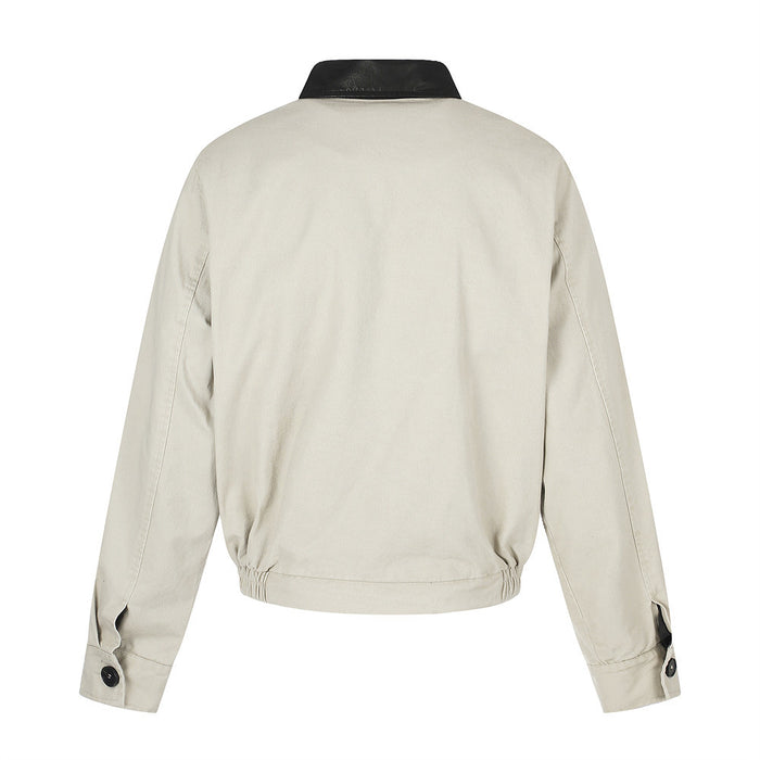 Cream workwear jacket back view with black contrast collar and elasticized hem