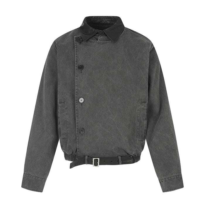 Charcoal workwear jacket front view with asymmetrical button placket, black collar, and belt hem