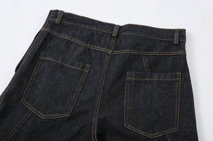 Back waistband and patch pockets on dark denim pants with contrast stitching