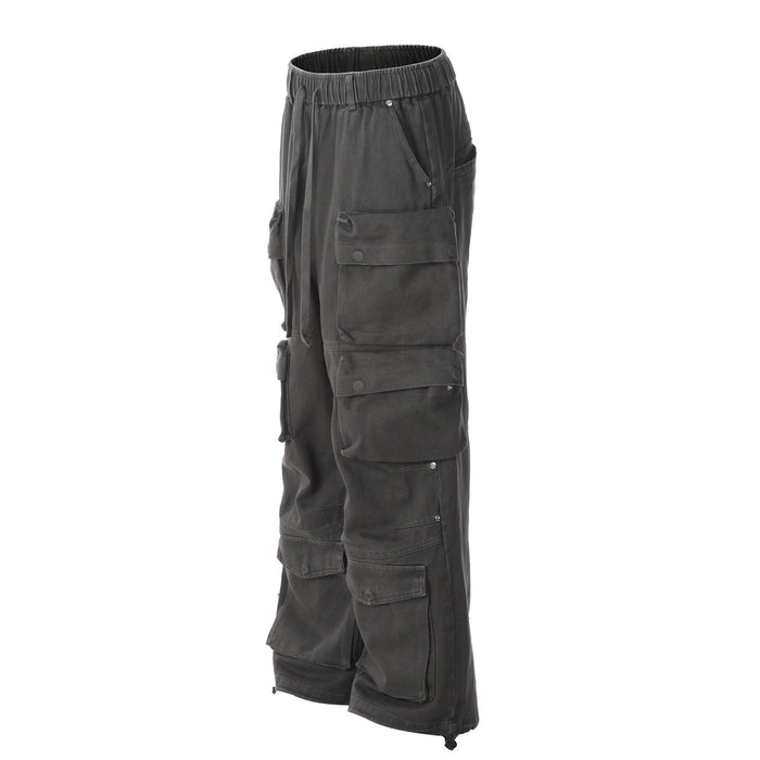 Black cargo pants three-quarter side view with stacked flap pockets