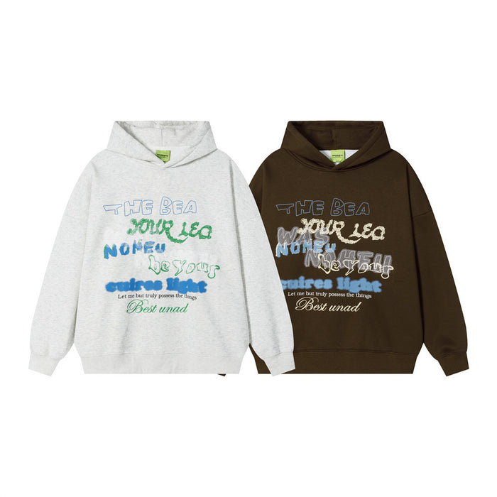 Front view of oversized graphic pullover hoodies in light gray and dark brown with multicolored lettering