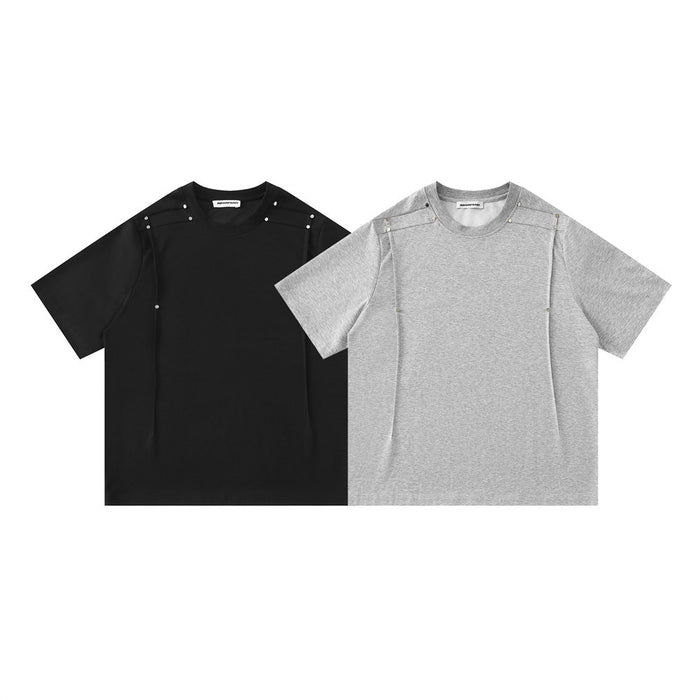 Black and light gray oversized T-shirt with studded shoulder details, front view