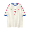 Cream pinstripe soccer jersey tee with blue V-neck, red shoulder stripes, and front number 7