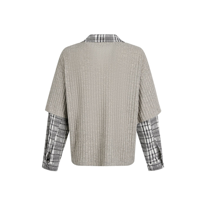 Back view of beige ribbed knit sweater with plaid sleeve cuffs and collar