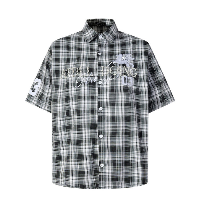 Front view of black-and-white plaid short-sleeve shirt with Pegasus embroidery and pearl lettering