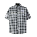 Front view of black-and-white plaid short-sleeve shirt with Pegasus embroidery and pearl lettering