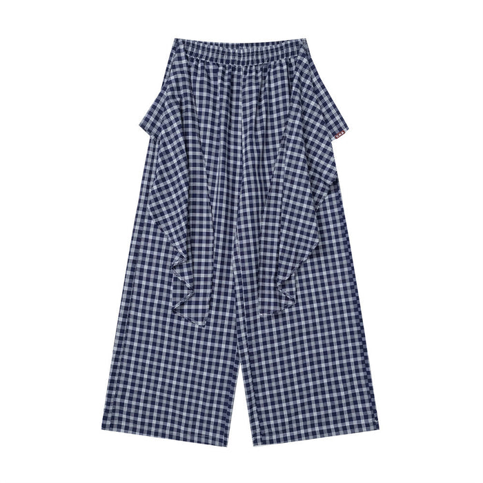 Navy plaid wide-leg pants with apron-style front overlay, front view