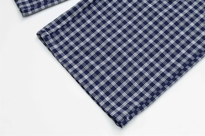 Close-up of wide plaid pant leg hem