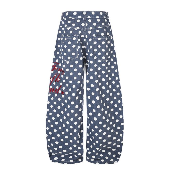 Rear view of blue wide-leg pants with white polka dots and curved hems