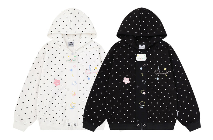 Oversized polka dot zip-up hoodie in white and black colorways with 3D cat patch and star embroidery on the front placket