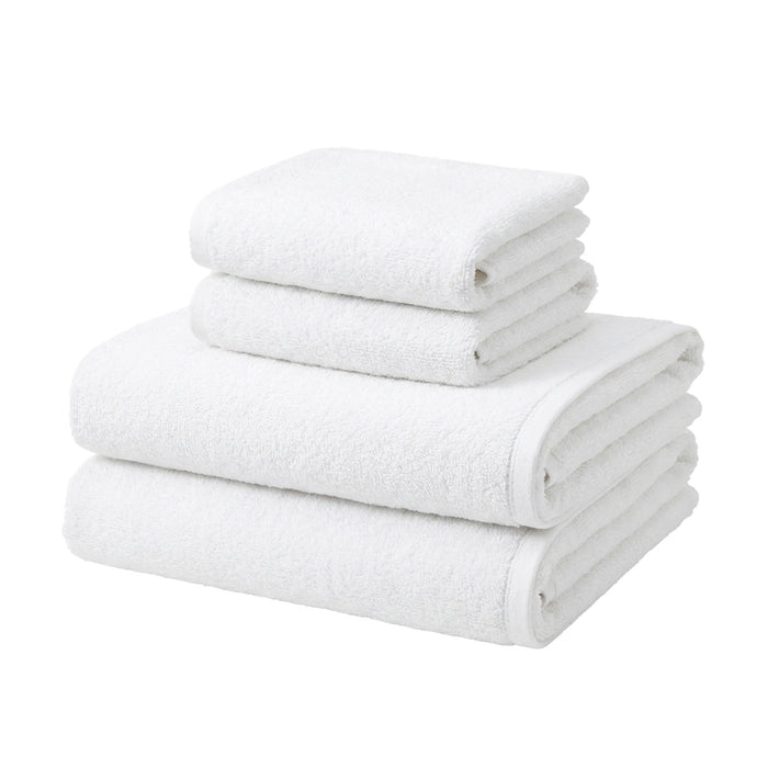 White cotton hand towels folded in a stack