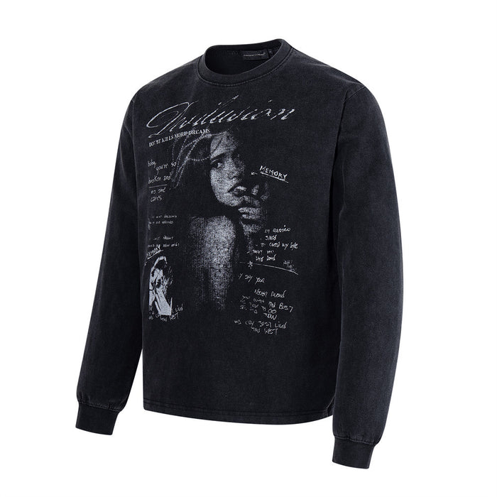 Front view of washed black oversized crew neck long sleeve T-shirt with distressed graphic print