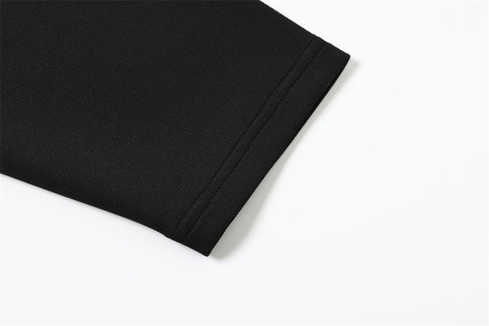 Black sleeve cuff detail on the layered-sleeve shirt jacket