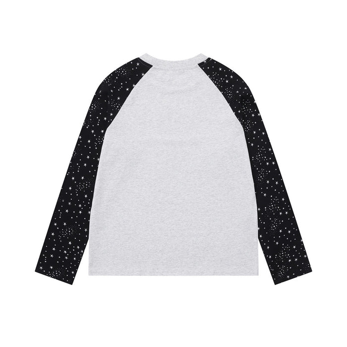 Light gray raglan long sleeve tee with black star-print sleeves shown in a flat front view
