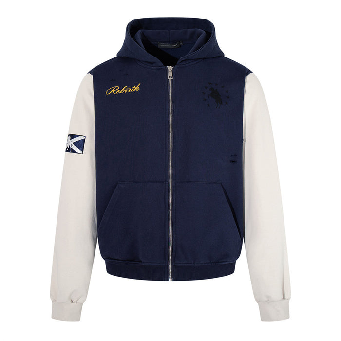 Front view of a navy and cream zip-up hoodie with kangaroo pockets, hood, ribbed hem, and chest graphics